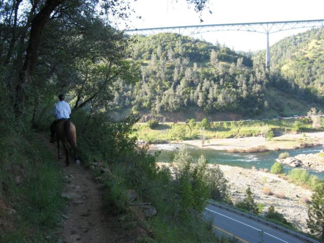 Patrick and Fergus high above hw-49 near the Confluence of the North and Middle Forks of the American River. Foresthill Bridge in the background.
